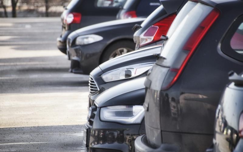 a row of cars in a parking lot